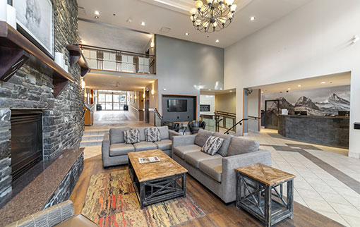 Hotel lobby with large seating area and high ceilings