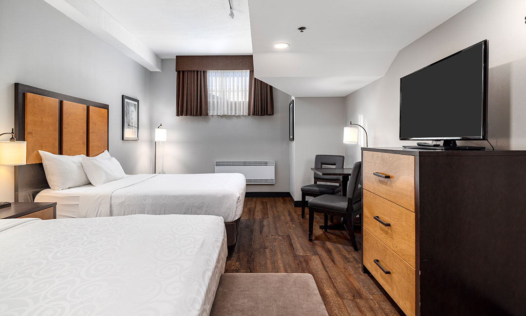 Standard Room Two Queens - Beds