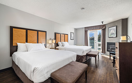 Hotel room with two queen beds and a balcony